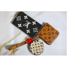 Louis Vuitton M69516 LV Crafty Trio Pouch in Caramel / Cream / Black Monogram Empreinte leather Louis Vuitton M69516 LV Crafty Trio Pouch in Caramel / Cream / Black Monogram Empreinte leather