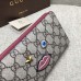 Gucci zip around wallet with embroidered face 431392 red Gucci zip around wallet with embroidered face 431392 red