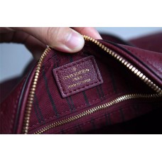 Louis Vuitton Speedy Bandouliere 26 Carmine Monogram Empreinte Leather Louis Vuitton Speedy Bandouliere 26 Carmine Monogram Empreinte Leather