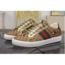 Men’s GG Disney x Gucci Ace sneaker Beige/ebony mini GG Supreme canvas with Mickey Mouse print Men’s GG Disney x Gucci Ace sneaker Beige/ebony mini GG Supreme canvas with Mickey Mouse print