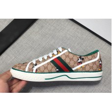 Mens and Womens Gucci 606111 Disney x Gucci Tennis 1977 sneaker with Web in Beige GG Supreme Mens and Womens Gucci 606111 Disney x Gucci Tennis 1977 sneaker with Web in Beige GG Supreme