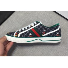 Mens and Womens Gucci 606111 Disney x Gucci Tennis 1977 sneaker with Web in Blue GG Supreme Mens and Womens Gucci 606111 Disney x Gucci Tennis 1977 sneaker with Web in Blue GG Supreme